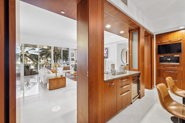 bar featuring tile patterned floors, wine cooler, visible vents, and recessed lighting