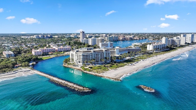 bird's eye view featuring a beach view, a water view, and a view of city