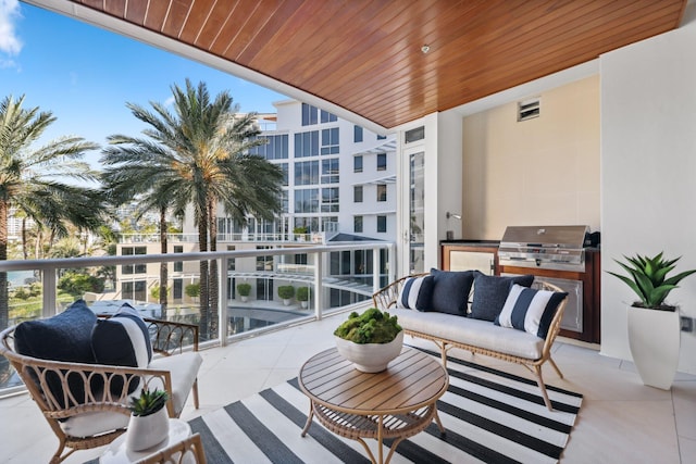 balcony featuring grilling area, outdoor lounge area, and area for grilling