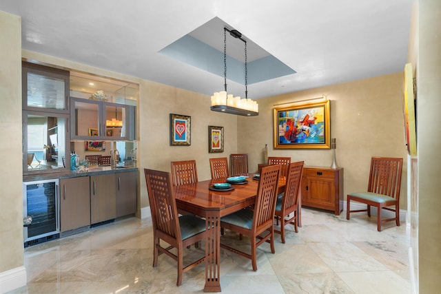 1600 S Ocean Blvd Unit Mph02, Lauderdale By The Sea, FL 33062 - dining space featuring wine cooler, wet bar, and baseboards
