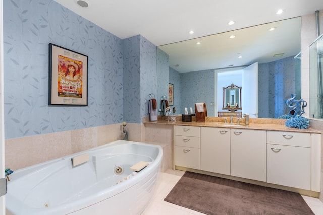 1600 S Ocean Blvd Unit Mph02, Lauderdale By The Sea, FL 33062 - full bathroom featuring wallpapered walls, a jetted tub, tile patterned flooring, vanity, and recessed lighting