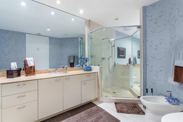 1600 S Ocean Blvd Unit Mph02, Lauderdale By The Sea, FL 33062 - full bathroom featuring a bidet, toilet, a stall shower, wallpapered walls, and vanity