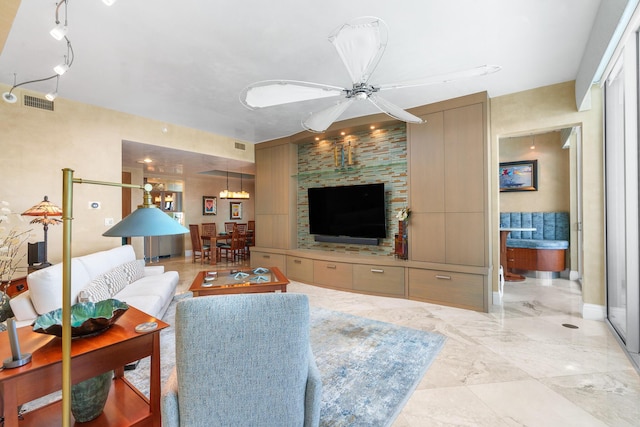 1600 S Ocean Blvd Unit Mph02, Lauderdale By The Sea, FL 33062 - living area featuring a ceiling fan and a chandelier