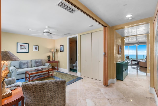 1600 S Ocean Blvd Unit Mph02, Lauderdale By The Sea, FL 33062 - living area featuring baseboards and ceiling fan