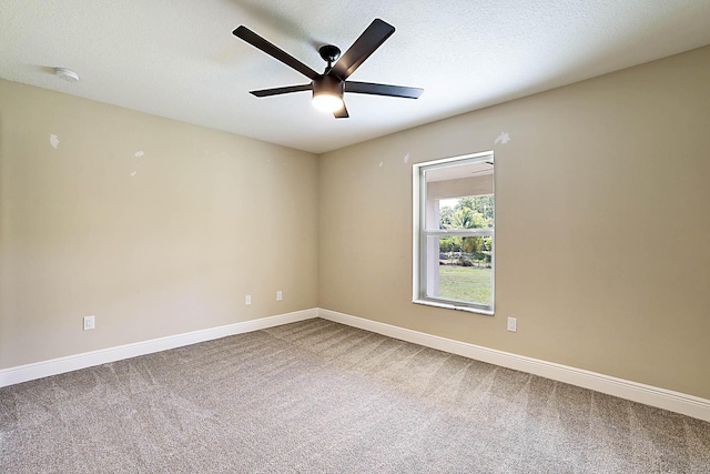 17854 N 71st Ln N, The Acreage, FL 33470 - empty room featuring a ceiling fan, carpet, baseboards, and a textured ceiling