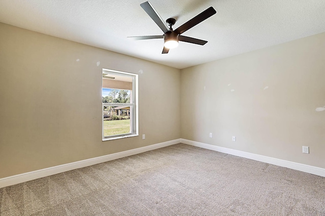 17854 N 71st Ln N, The Acreage, FL 33470 - spare room featuring carpet, ceiling fan, baseboards, and a textured ceiling