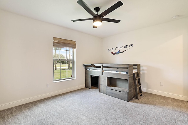 17854 N 71st Ln N, The Acreage, FL 33470 - unfurnished bedroom featuring baseboards, carpet, and ceiling fan