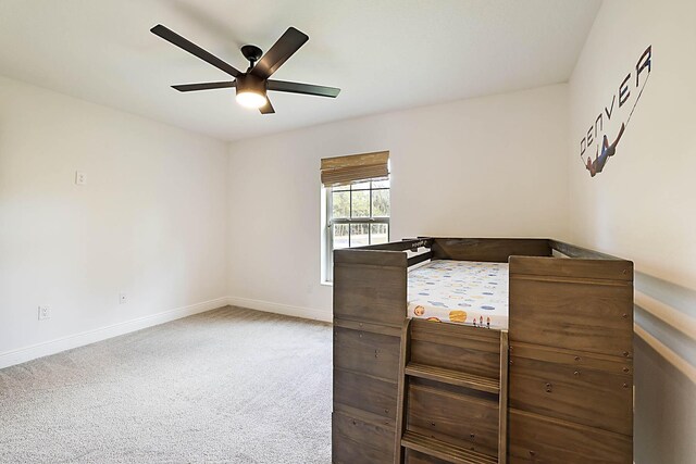 17854 N 71st Ln N, The Acreage, FL 33470 - unfurnished bedroom featuring baseboards, carpet floors, and a ceiling fan