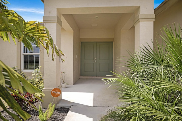 17854 N 71st Ln N, The Acreage, FL 33470 - entrance to property with stucco siding