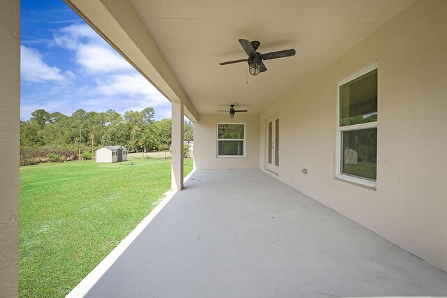 17854 N 71st Ln N, The Acreage, FL 33470 - view of patio with a storage unit, ceiling fan, and an outdoor structure