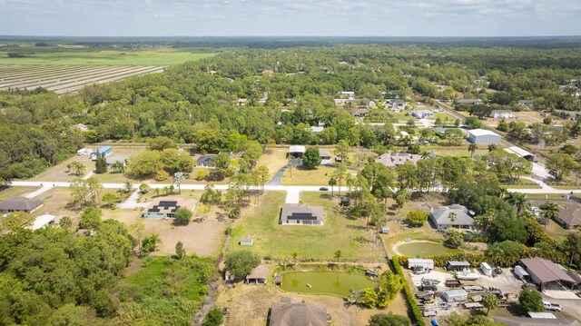 17854 N 71st Ln N, The Acreage, FL 33470 - aerial view of property and surrounding area with nearby suburban area and a large body of water