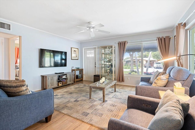 265 NE 13th St, Delray Beach, FL 33444 - living room featuring wood finished floors, a ceiling fan, ornamental molding, and baseboards