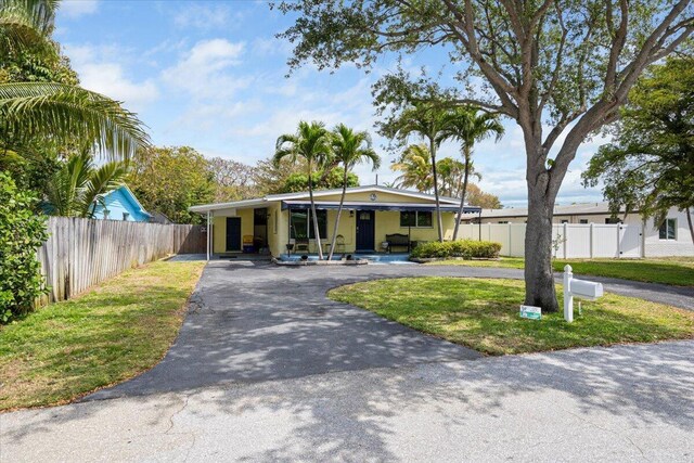 265 NE 13th St, Delray Beach, FL 33444 - mid-century inspired home with asphalt driveway