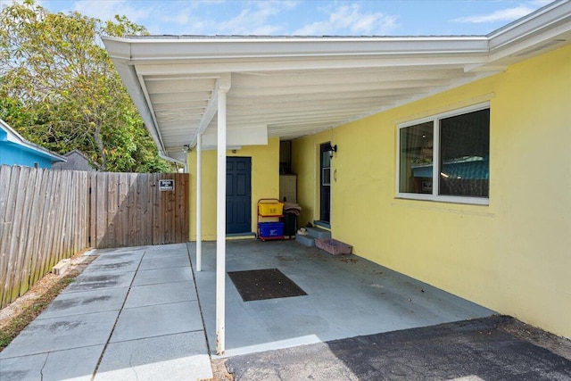 265 NE 13th St, Delray Beach, FL 33444 - view of patio / terrace featuring a carport