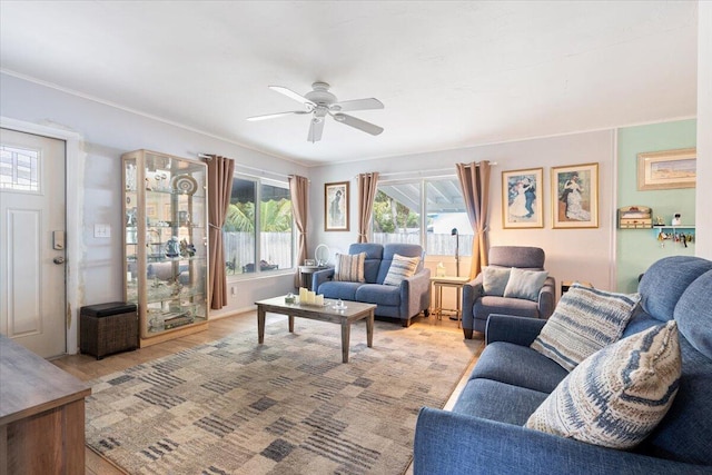 265 NE 13th St, Delray Beach, FL 33444 - living area featuring ceiling fan, light wood-style floors, and crown molding