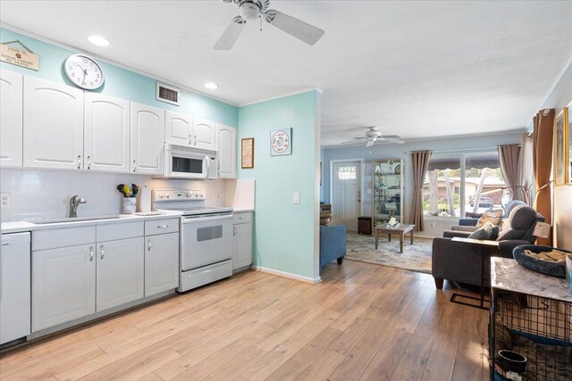 265 NE 13th St, Delray Beach, FL 33444 - kitchen featuring white appliances, a sink, ceiling fan, open floor plan, and recessed lighting