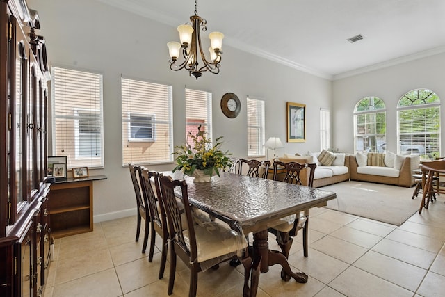 707 Cresta Cir, West Palm Beach, FL 33413 - dining space featuring visible vents, light tile patterned floors, baseboards, a notable chandelier, and ornamental molding