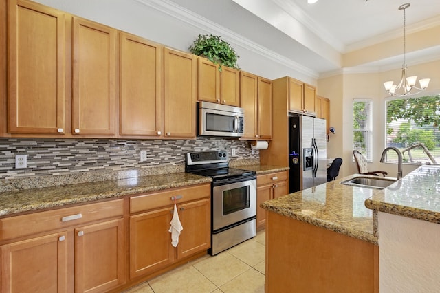 707 Cresta Cir, West Palm Beach, FL 33413 - kitchen featuring crown molding, appliances with stainless steel finishes, a sink, light tile patterned floors, and tasteful backsplash