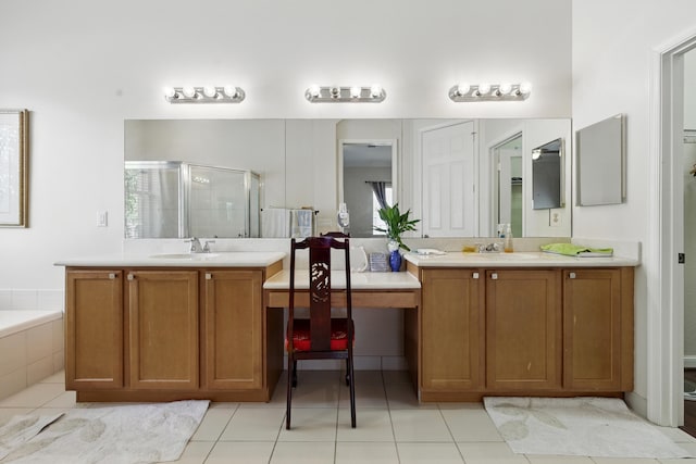 707 Cresta Cir, West Palm Beach, FL 33413 - full bathroom with a sink, tile patterned flooring, a stall shower, and two vanities