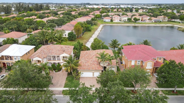 707 Cresta Cir, West Palm Beach, FL 33413 - bird's eye view featuring a water view and a residential view