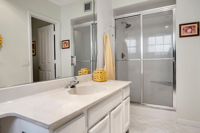 6117 Old Court Rd Unit 135, Boca Raton, FL 33433 - bathroom featuring a shower stall, tile patterned flooring, visible vents, and vanity