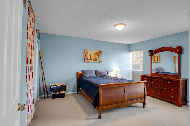 6117 Old Court Rd Unit 135, Boca Raton, FL 33433 - bedroom with baseboards, carpet, and a textured ceiling