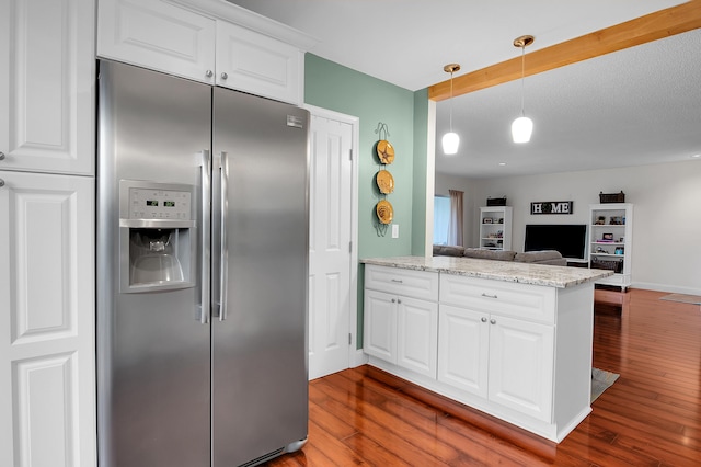 6117 Old Court Rd Unit 135, Boca Raton, FL 33433 - kitchen featuring wood finished floors, open floor plan, stainless steel fridge, a peninsula, and white cabinetry
