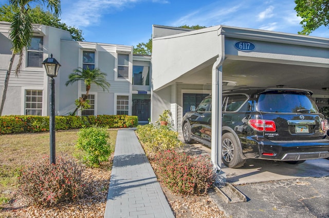 6117 Old Court Rd Unit 135, Boca Raton, FL 33433 - exterior space with a carport and stucco siding