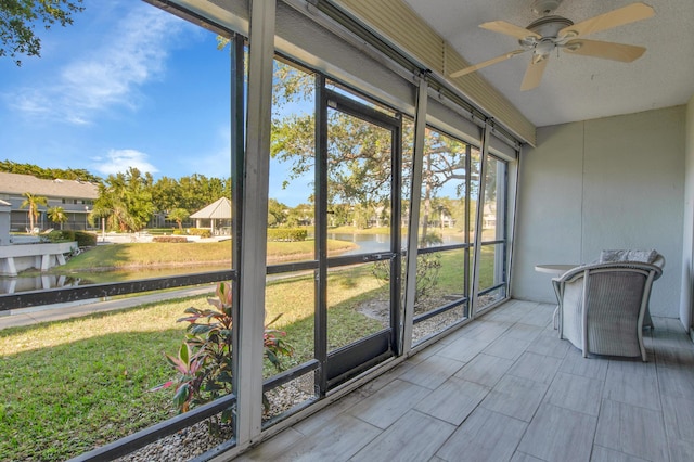 6117 Old Court Rd Unit 135, Boca Raton, FL 33433 - unfurnished sunroom featuring a water view and a ceiling fan