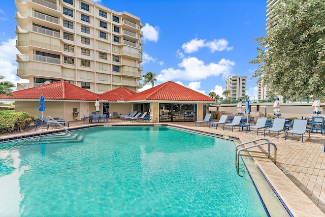 community pool with a patio