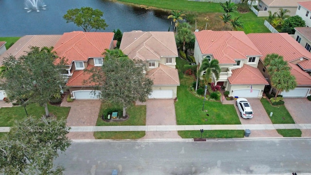 aerial view with a residential view and a water view