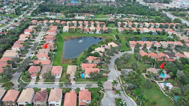 aerial view featuring a residential view and a water view
