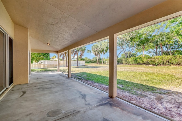 view of patio / terrace featuring fence