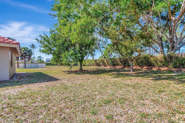 view of yard featuring fence
