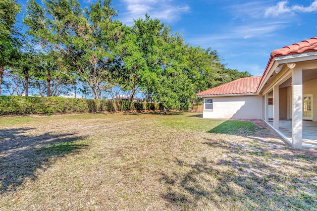 view of yard featuring fence