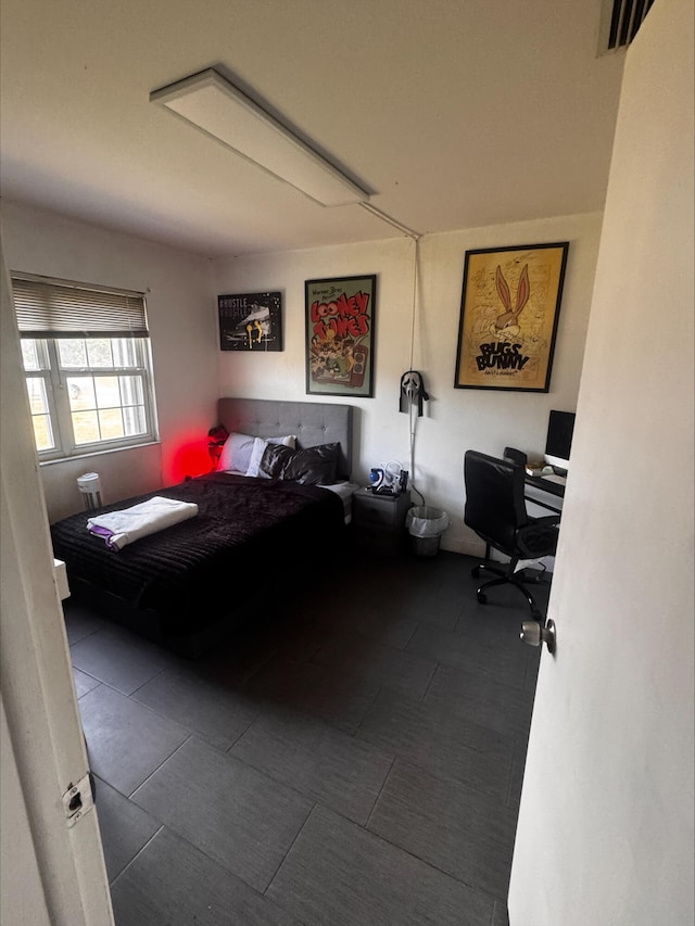 bedroom with visible vents