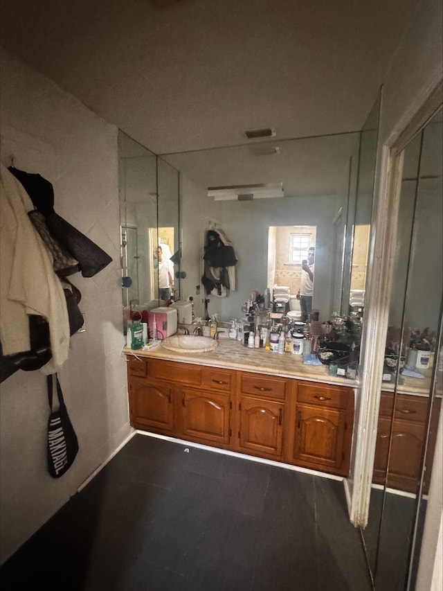 bathroom with visible vents and vanity