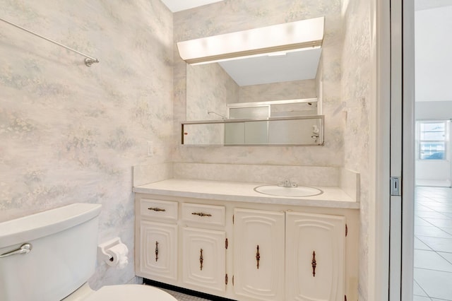 955 Circle A Dr Unit A, Delray Beach, FL 33445 - full bathroom with toilet, vanity, tile patterned floors, a shower with door, and wallpapered walls