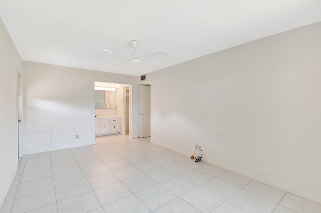 955 Circle A Dr Unit A, Delray Beach, FL 33445 - unfurnished room with a ceiling fan, light tile patterned floors, and baseboards