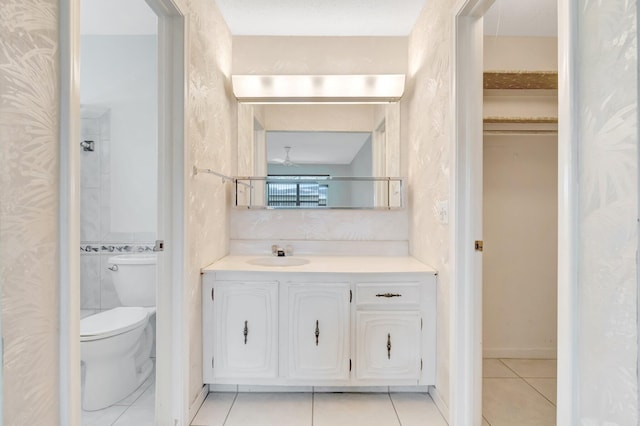 955 Circle A Dr Unit A, Delray Beach, FL 33445 - bathroom with tile patterned flooring, toilet, vanity, and ceiling fan