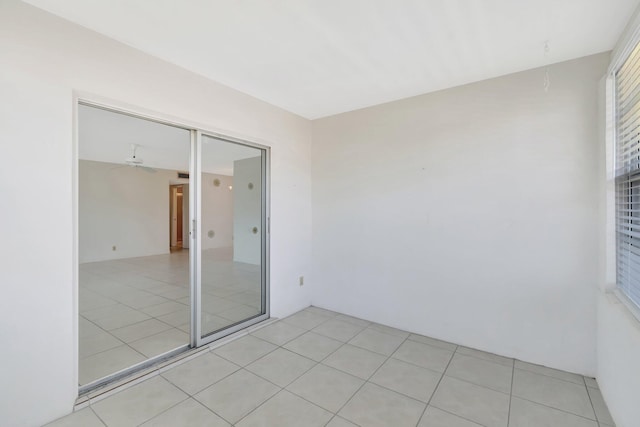 955 Circle A Dr Unit A, Delray Beach, FL 33445 - empty room with light tile patterned flooring