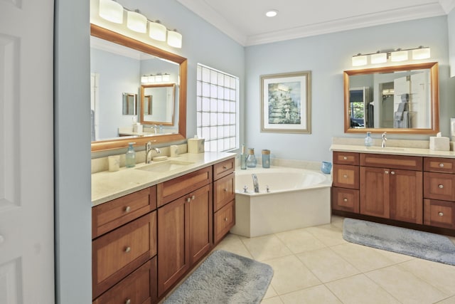 full bath with a sink, crown molding, a garden tub, and two vanities