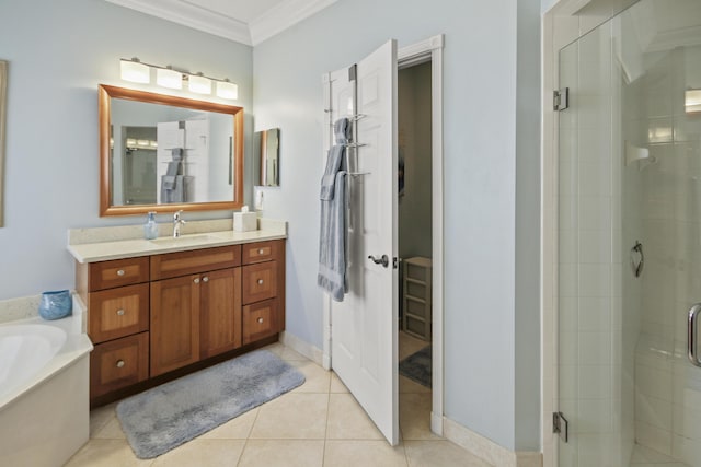 bathroom featuring a bath, crown molding, tile patterned flooring, a stall shower, and vanity