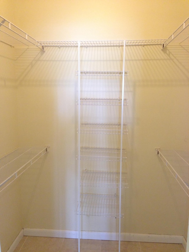 880 Cypress Park Way Unit E, Deerfield Beach, FL 33064 - spacious closet with tile patterned floors