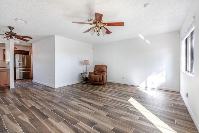 5606 Channel Dr, Lake Worth, FL 33463 - unfurnished room with dark wood-type flooring, a ceiling fan, and baseboards