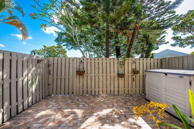 5606 Channel Dr, Lake Worth, FL 33463 - view of patio featuring a gate and fence