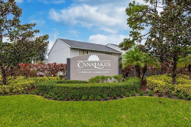 5606 Channel Dr, Lake Worth, FL 33463 - community / neighborhood sign featuring a yard