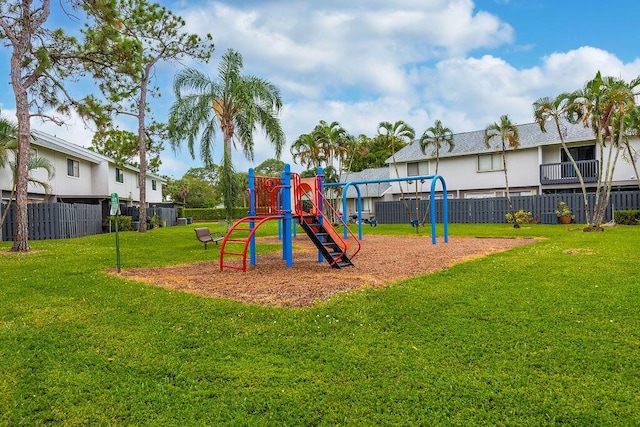 5606 Channel Dr, Lake Worth, FL 33463 - community playground featuring a yard and fence