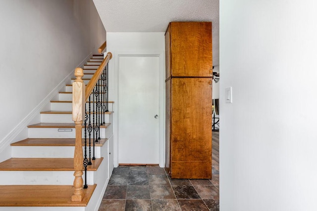 5606 Channel Dr, Lake Worth, FL 33463 - staircase with baseboards and stone finish floor