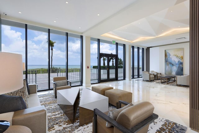 2600 S Ocean Blvd Phd, Phd, Boca Raton, FL 33432 - building lobby featuring a wall of windows, a water view, and recessed lighting